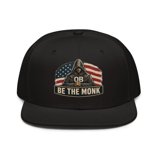 Black embroidered snapback hat by OB DANGEROUS with "Be The Monk" design, suitable for gym, street, and casual wear.