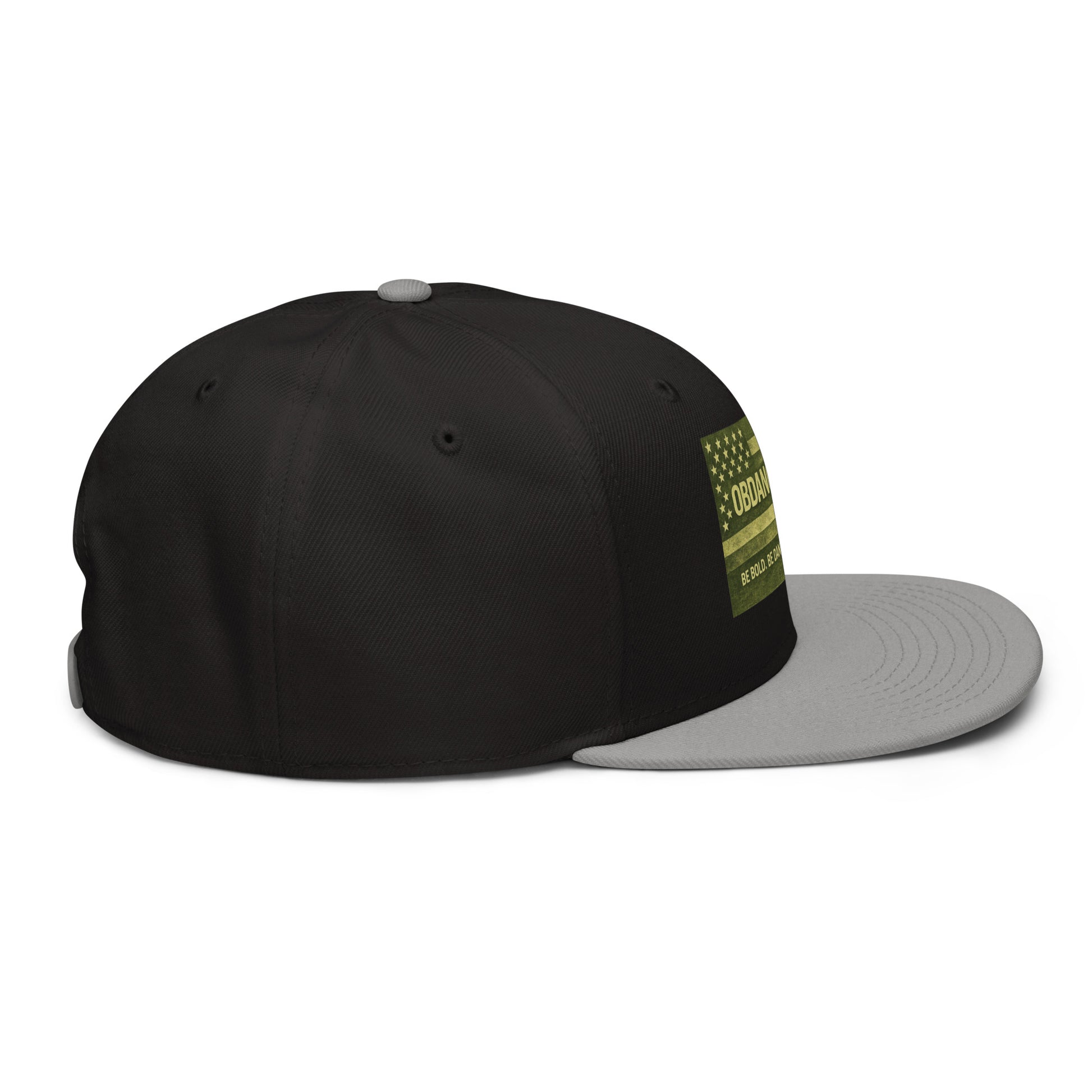 Gray and black embroidered snapback hat by OB DANGEROUS with logo detail on the right side.