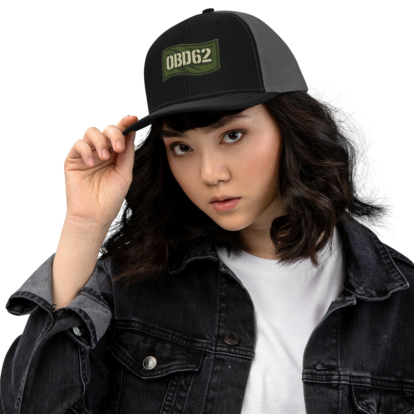 Black OB DANGEROUS OBD62 trucker cap with embroidered logo on front, snapback style for gym and streetwear fashion.
