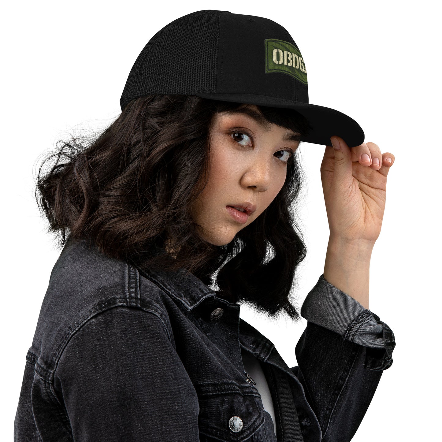 Black OBD62 Trucker Cap with embroidery, featuring a snapback design and right-side view, ideal for gym and streetwear styles.