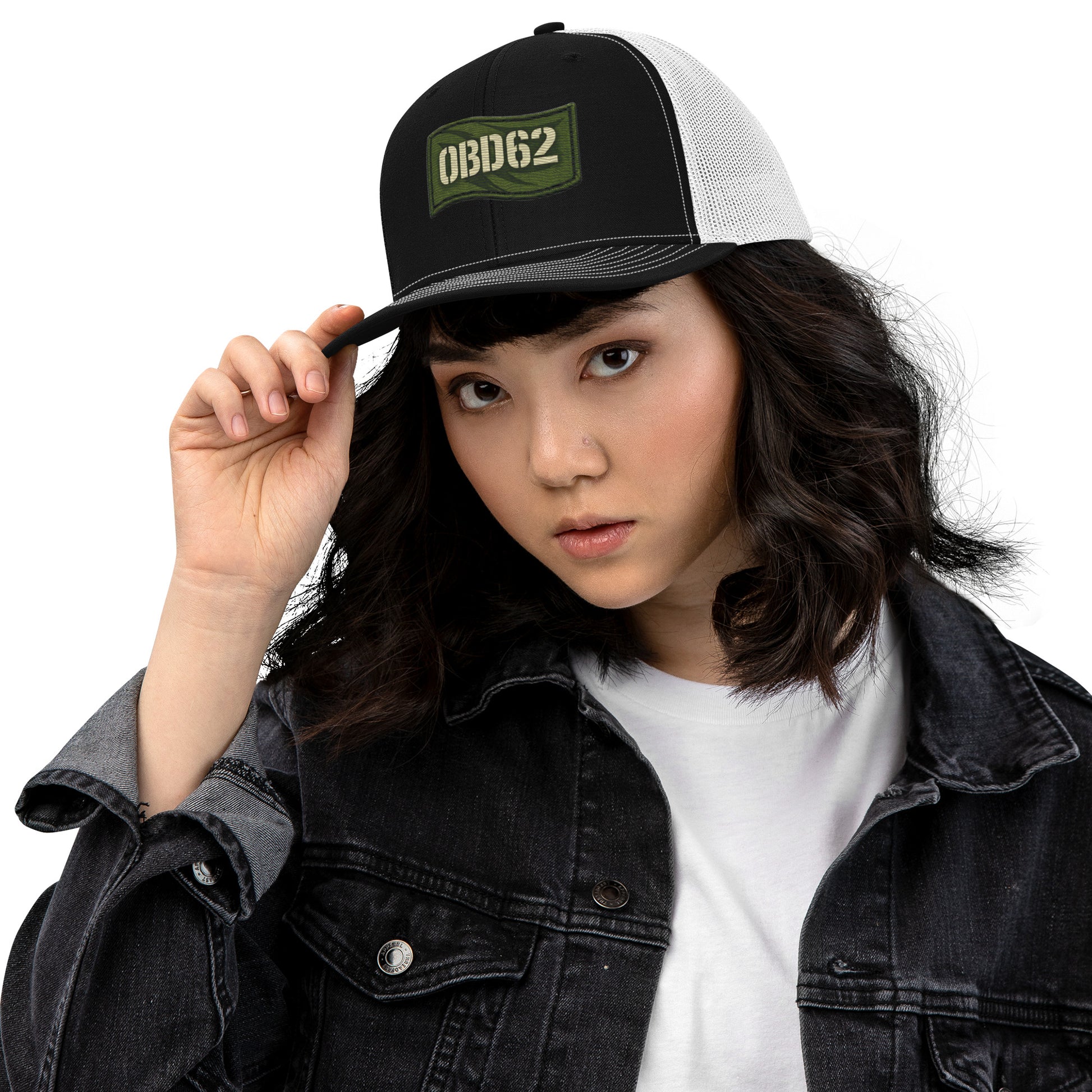 Black and white embroidered OBD62 Trucker Cap by OB DANGEROUS with snapback closure, designed for gym and streetwear styles.