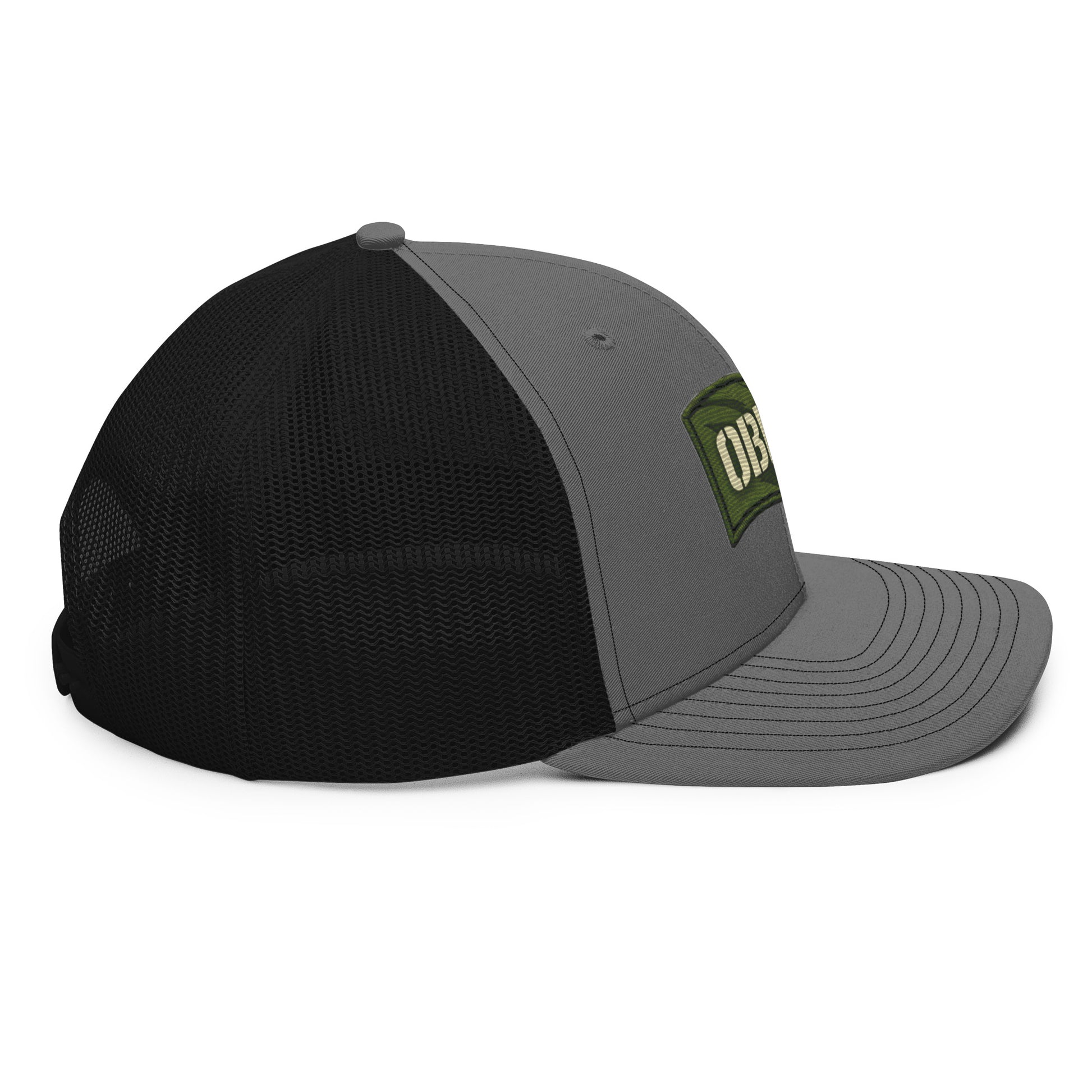 Charcoal black OB DANGEROUS OBD62 trucker cap with embroidery, snapback style, shown from right side view.