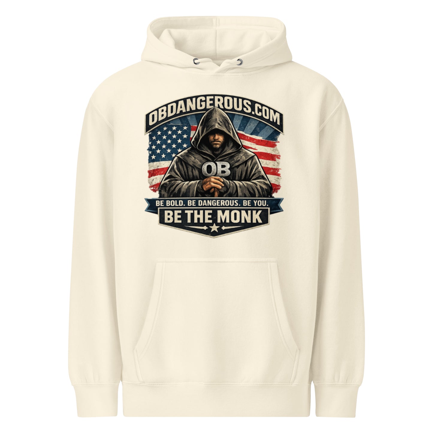 Unisex Be The Monk premium mid-weight hoodie by OB DANGEROUS, sandy shell color, front view, casual streetwear style.